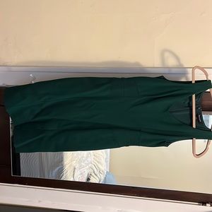 Green sleeveless sheath dress